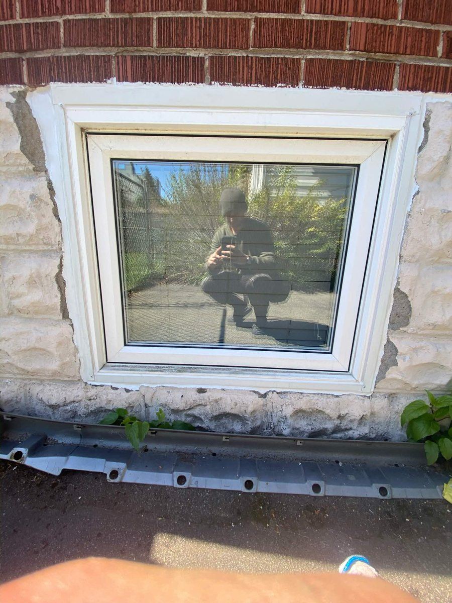 After: Basement window — surround resealed and refinished