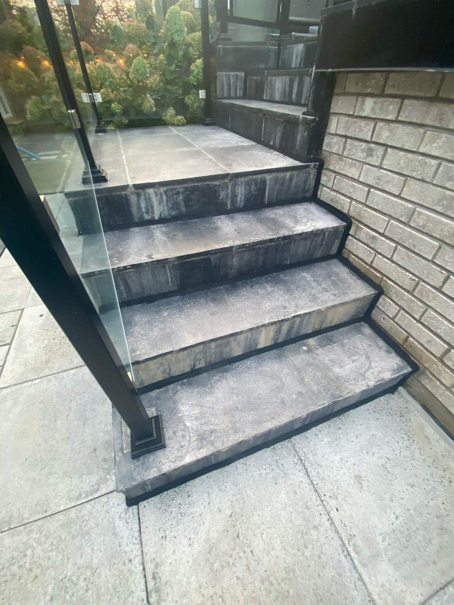 After: Glass railing base and step joint