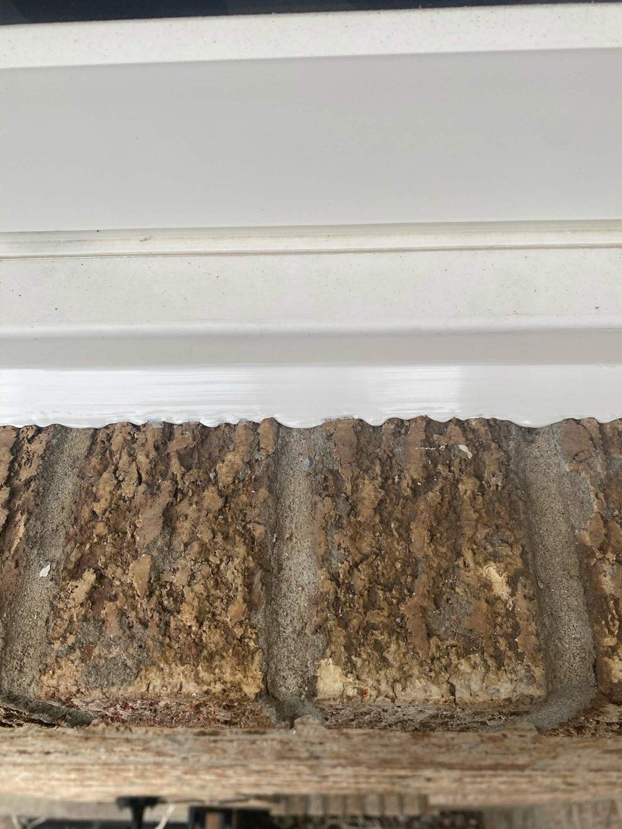 After: Stone sill and header — joint rebuilt